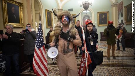 A pro-Trump mob confronts U.S. Capitol police outside the Senate chamber of the U.S. Capitol Building on January 06, 2021 in Washington, DC.