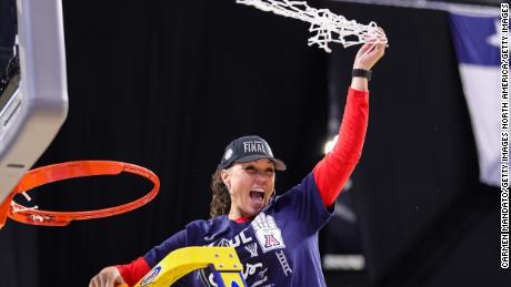 Arizona Wildcats head coach Adia Barnes of the Arizona Wildcats cuts the net after defeating the Indiana Hoosiers in the Elite Eight round of the NCAA Women&#39;s Basketball Tournamen.