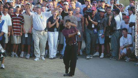 Woods takes his second shot on the 18th during the third playoff hole in the PGA Championship.