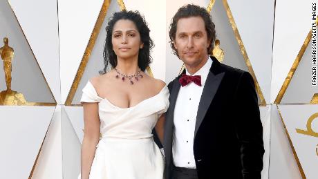 HOLLYWOOD, CA - MARCH 04: Matthew McConaughey (L) and Camila Alves attend the 90th Annual Academy Awards at Hollywood &amp; Highland Center on March 4, 2018 in Hollywood, California.