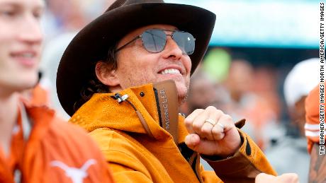 McConaughey celebrates on the Texas Longhorns sideline in the second half against the Texas Tech Red Raiders at Darrell K Royal-Texas Memorial Stadium on November 29, 2019 in Austin, Texas.