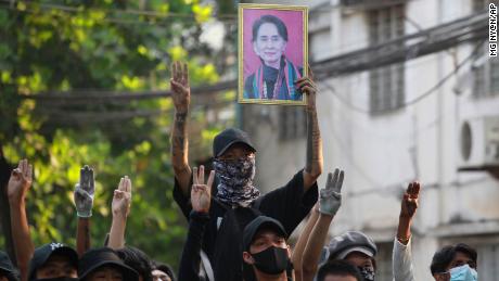 Anti-coup demonstrators prepare to confront police during a protest in Tarmwe township, Yangon, Myanmar, on Thursday.