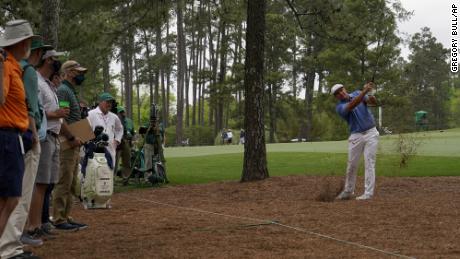 Bryson DeChambeau hits out of the pine straw on the seventh hole during the second round of the Masters.