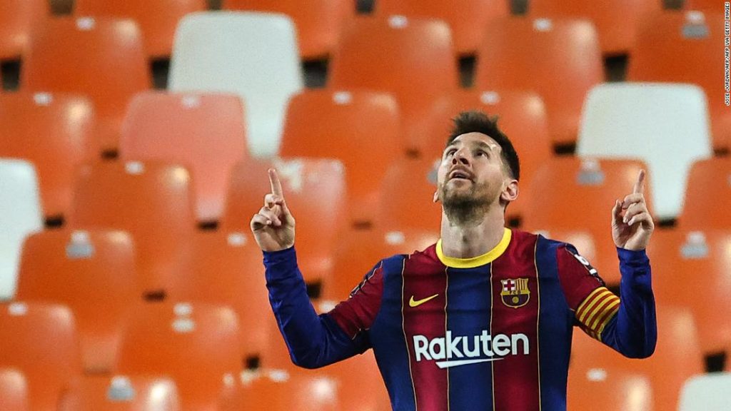 Lionel Messi double against Valencia keeps Barcelona's title hopes alive