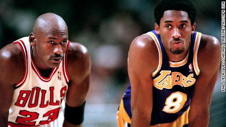 Jordan talks to Bryant during free throws in 1997.