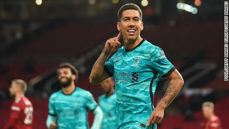 Firmino celebrates after scoring his side&#39;s second goal against Manchester United.