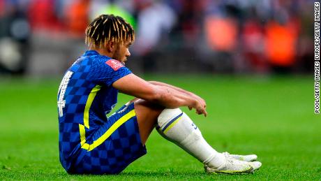 Reece James sits downcast on the pitch after Chelsea&#39;s defeat in Saturday&#39;s FA Cup final. 