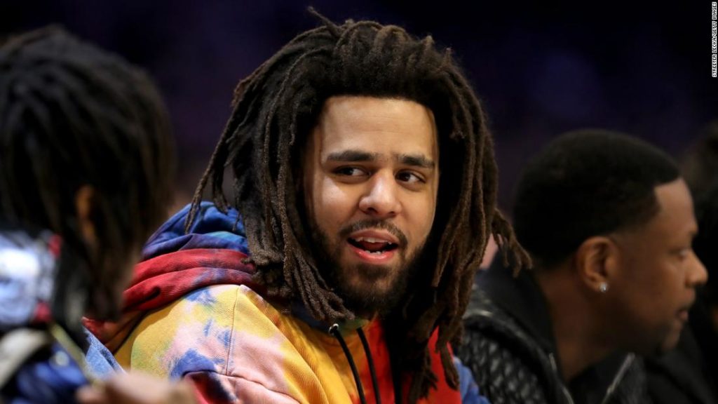 J. Cole: Rapper makes his debut in African basketball league the same weekend his album drops
