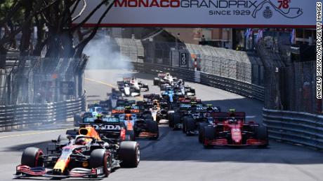Verstappen, left, Sainz, right, and other drivers compete during the  Monaco Grand Prix.