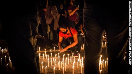 A candlelight vigil for demonstrator Lucas Villa was held last week. 