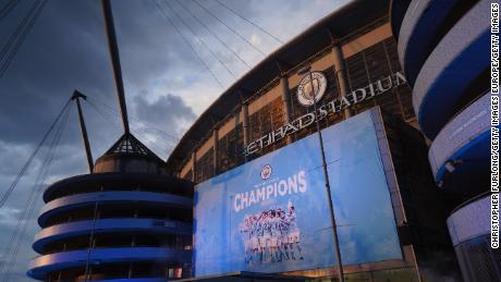 A large display outside Etihad Stadium reads &quot;Champions&quot; as Manchester City has been confirmed as Premier League champions.