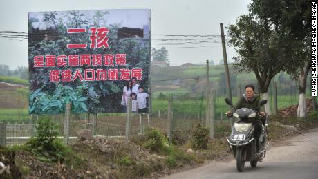 A signboard promoting China&#39;s two-child policy in Neijiang, China, on March 23, 2017. 