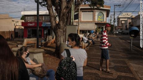 People gather at a park in Serrana, Brazil, on Wednesday, May 26, 2021.