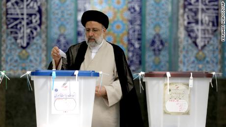 Ebrahim Raisi, a candidate in Iran&#39;s presidential elections, casts his vote at a polling station in Tehran, Iran Friday, June 18, 2021. 