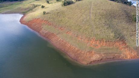 Low water levels are shown on the Jacareí River in Brazil&#39;s São Paulo state on June 13, 2021. A drought that has parched large parts of the country is also stoking worries about the coming fire season.