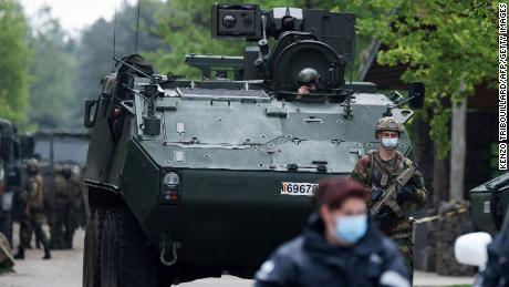 Police hunt for man who had rocket launcher and threatened Belgium&#39;s top virologist