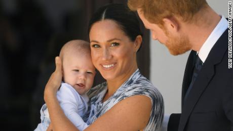 Prince Harry, Duke of Sussex, Meghan, Duchess of Sussex and their baby son Archie Mountbatten-Windsor at a meeting with Archbishop Desmond Tutu in 2019.
