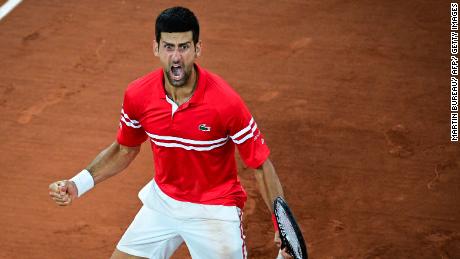 Novak Djokovic celebrates after winning against Italy&#39;s Matteo Berrettini at the French Open.