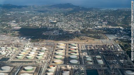 A Caribbean island bet its future on petrochemicals. Then oil rained down on homes.