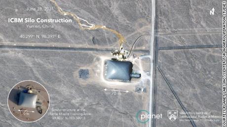 A likely single Chinese missile silo with a construction dome over the top.