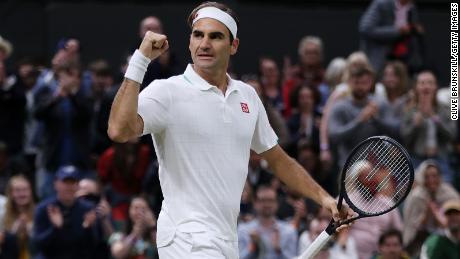Federer celebrates winning match point against Sonego.
