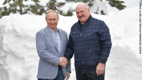 Russian President Vladimir Putin (left) shakes hands with his Belarussian counterpart Alexander Lukashenko during their meeting in Sochi, Russia, on February 22.