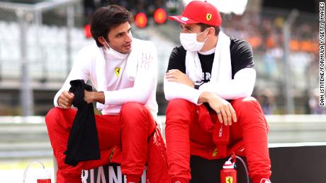 Carlos Sainz and Leclerc  talk on the grid ahead of the Styrian Grand Prix at Red Bull Ring on June 27, 2021 in Spielberg, Austria.