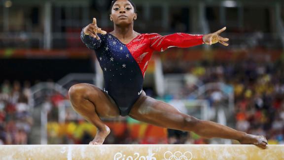Biles competes on the balance beam at the 2016 Olympics in Rio de Janeiro.