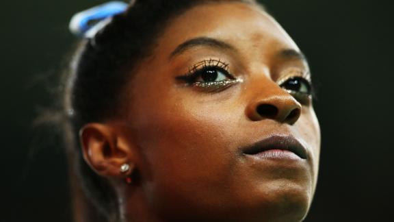 Biles looks on during competition at the 2016 Olympics.