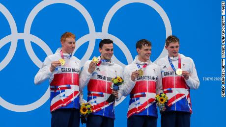 Britain&#39;s winning 4x200m relay team from left to right: Duncan Scott, Tom Dean, James Guy and Matthew Richards.