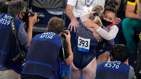 Lee hugs Jade Carey after it was clear she had won gold.