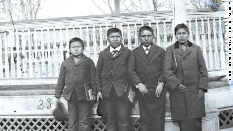 Four boys posing for a photo on the grounds of the Carlisle Indian Industrial School in 1879. Alvan Kills Seven Horses (One That Kills Seven Horses), second from left, was buried there and his remains are among those that will be repatriated to the Rosebud Sioux reservation next week.