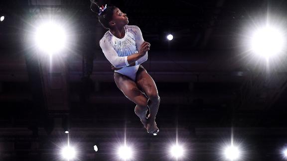 Simone Biles competes in the floor exercise during the World Championships in Stuttgart, Germany, in October 2019.
