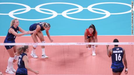 Justine Wong-Orantes (in red) celebrates with teammates during the women&#39;s volleyball semifinal between the United States and Serbia on August 6, 2021. 