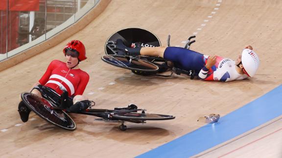 Frederik Madsen of Team Denmark and Charlie Tanfield of Team Great Britain on the ground after the fall.