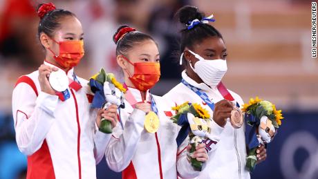 Guan Chenchen wins balance beam gold at the Tokyo Olympics as Simone Biles claims bronze