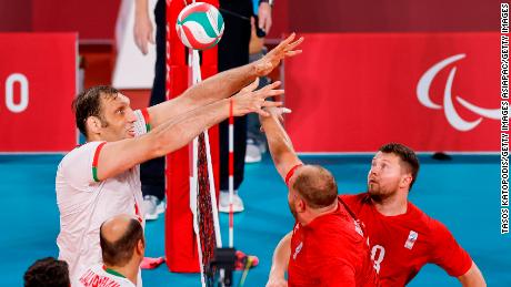 Mehrzad competes at the net against the RPC&#39;s Viktor Milenin during the men&#39;s sitting volleyball final.