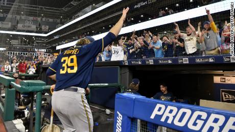 Corbin Burnes of the Milwaukee Brewers waves to fans as he leaves the field after throwing a combined no-hitter on Saturday.