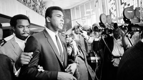 Muhammad Ali leaving the Federal Building in Houston on June 19, 1967
during his trial for refusing to be inducted into the Armed Services.