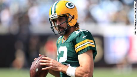 Rodgers warms up prior to the game against the Saints.